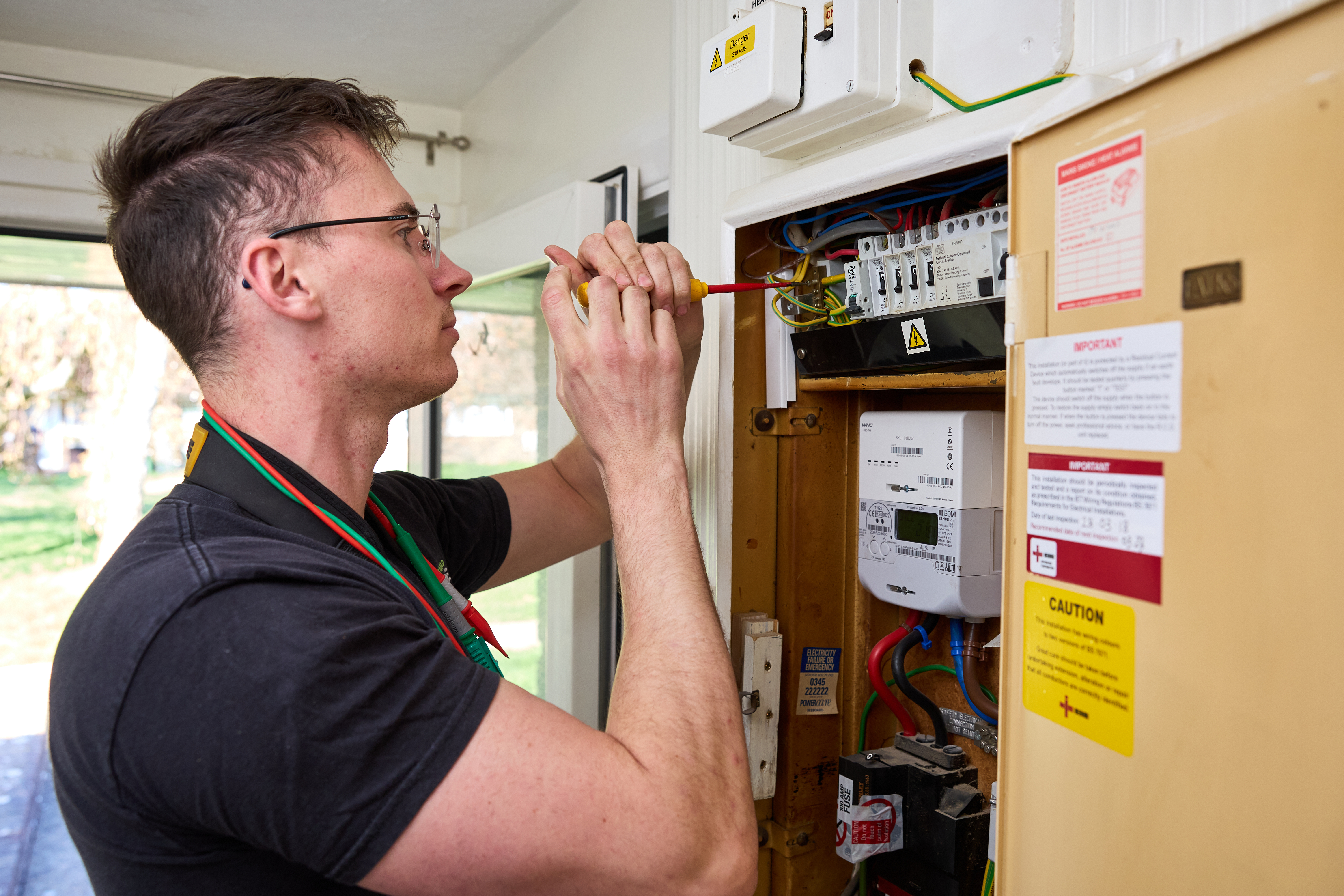 TP_Photo_0B3A0896.jpg A HomeFix operative is repairing the electrical wiring in a fuse box